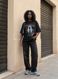 DAXUEN black oversized distressed graphic person t-shirt — model photo