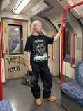 DAXUEN Distressed graphic portrait t-shirt in black and white — model photo