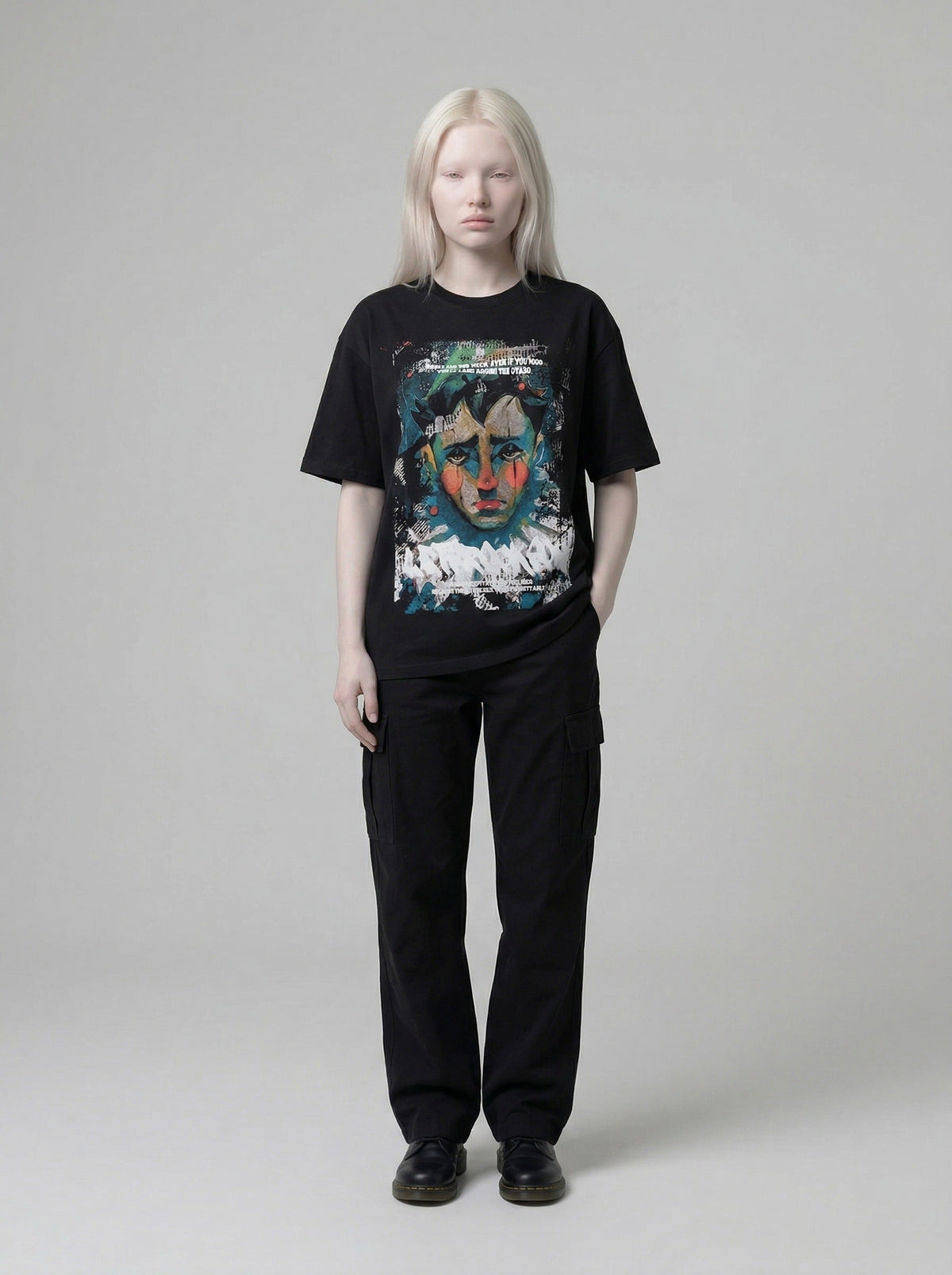 DAXUEN Distressed graphic portrait t-shirt in black and white — model photo