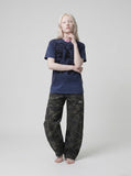 DAXUEN Distressed Graphic Print Crew Neck T-Shirt | DAXUEN — model photo