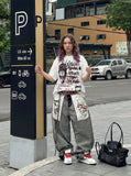 DAXUEN White short-sleeve t-shirt with distressed graphic print — model photo