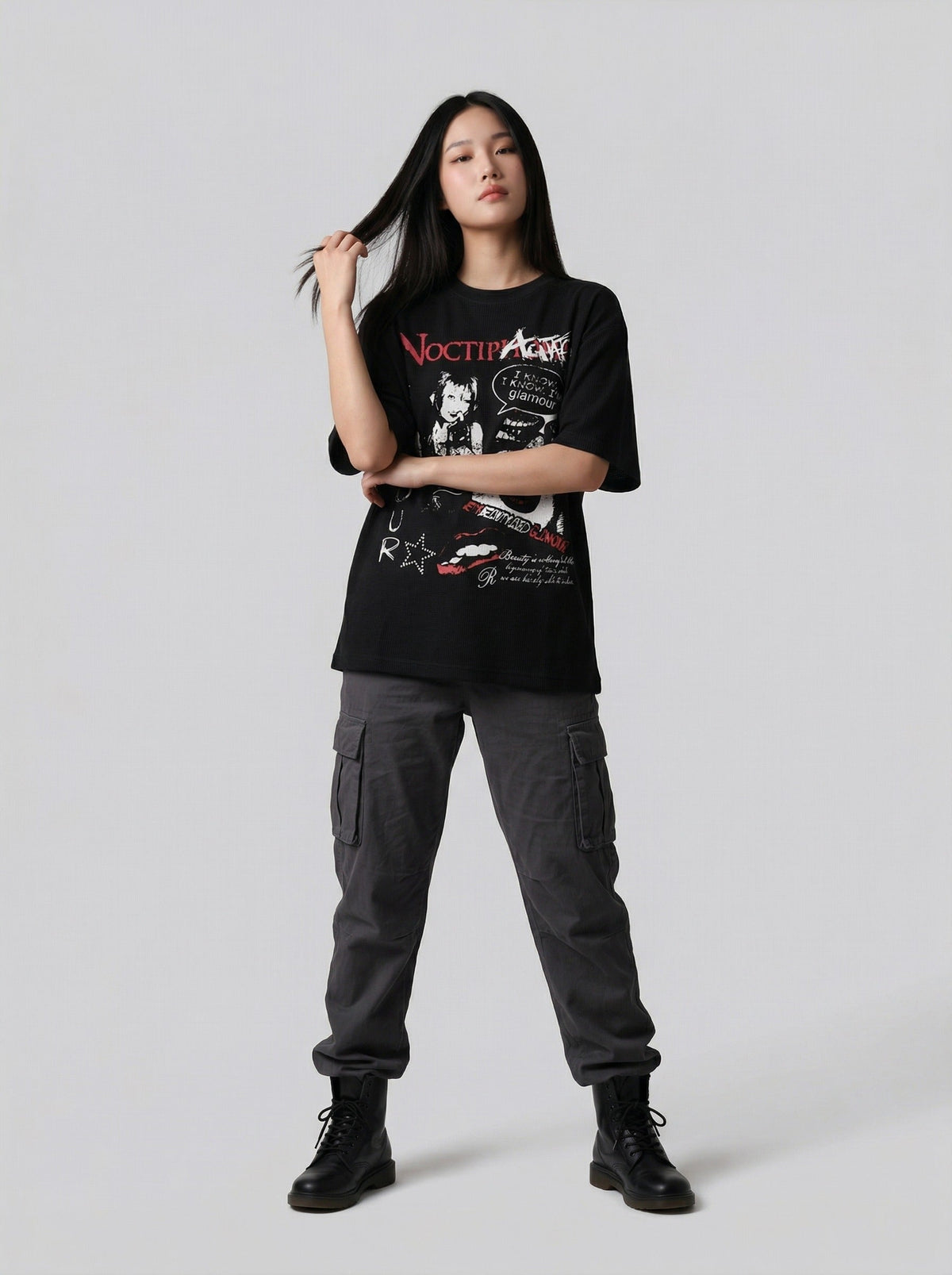 DAXUEN Black short-sleeved t-shirt with distressed graphic design — model photo