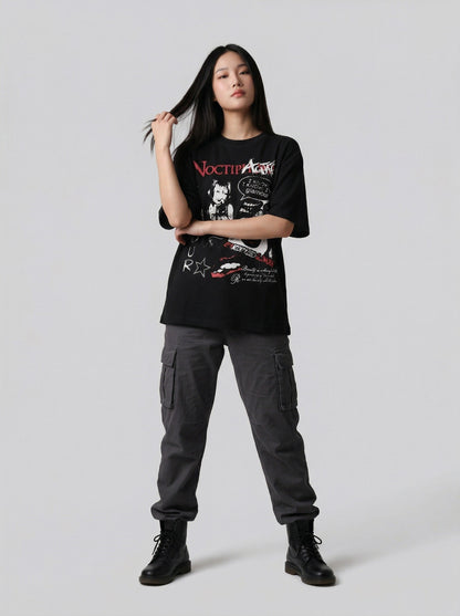 DAXUEN Black short-sleeved t-shirt with distressed graphic design — model photo