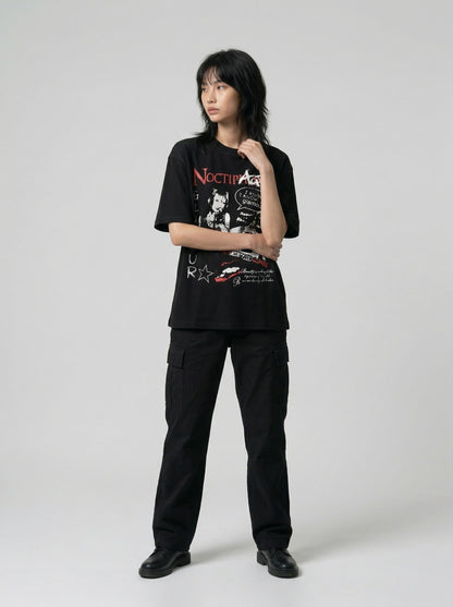 DAXUEN Black short-sleeved t-shirt with distressed graphic design — model photo