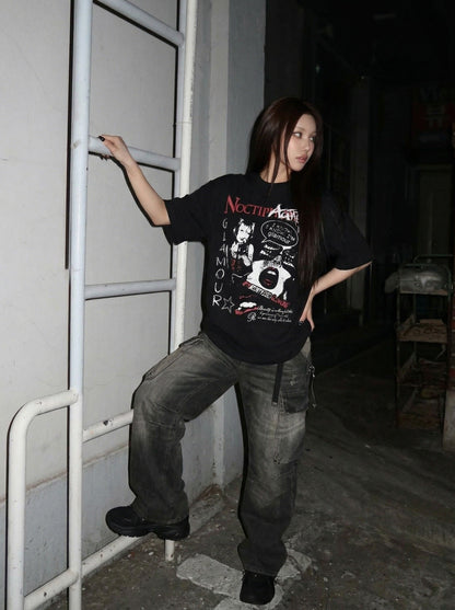 DAXUEN Black short-sleeved t-shirt with distressed graphic design — model photo