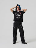 DAXUEN Distressed graphic ringer T-shirt with ribbed collar and cuffs — model photo