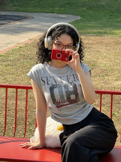 DAXUEN Distressed graphic ruched short-sleeved t-shirt — model photo