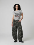DAXUEN Distressed graphic ruched short-sleeved t-shirt — model photo
