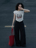 DAXUEN Distressed graphic ruched short-sleeved t-shirt — model photo