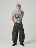 DAXUEN Distressed graphic ruched short-sleeved t-shirt — model photo