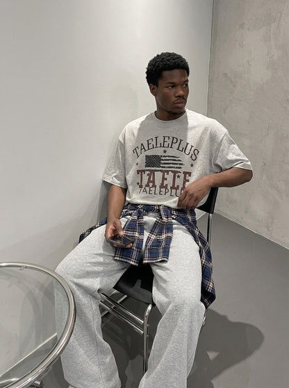 DAXUEN Men's short-sleeve distressed graphic t-shirt — model photo