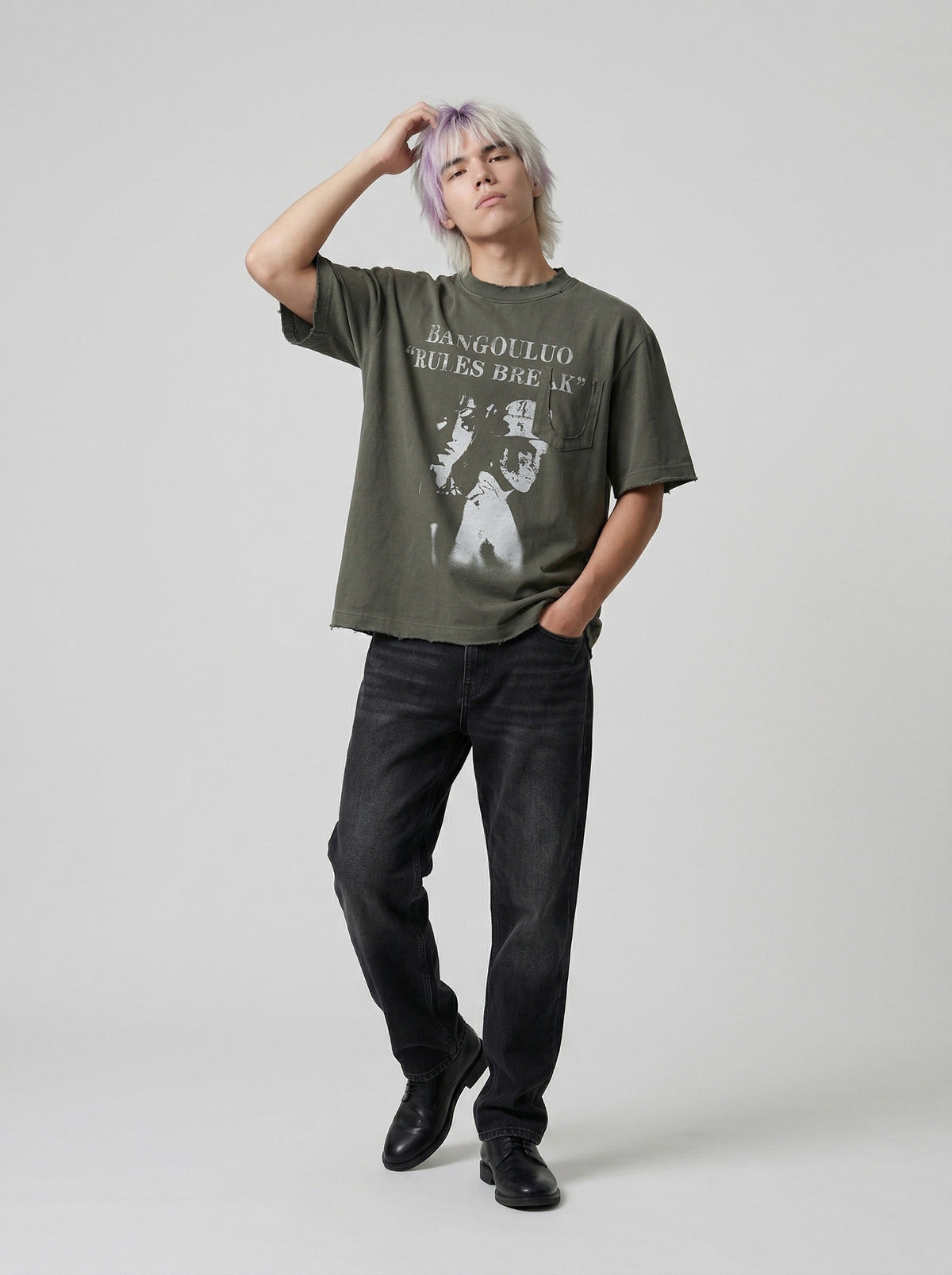 DAXUEN Distressed graphic T-shirt with raw-cut edges — model photo