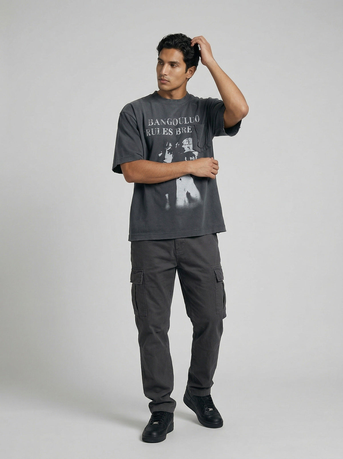 DAXUEN Distressed graphic T-shirt with raw-cut edges — model photo