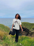 DAXUEN Distressed graphic t-shirt with plaid fabric details — model photo