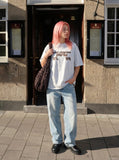 DAXUEN Distressed graphic t-shirt with plaid fabric details — model photo