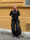 DAXUEN Distressed graphic t-shirt with plaid fabric details — model photo