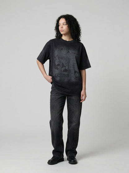 DAXUEN Distressed black graphic t-shirt with raw-edge neckline — model photo