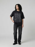 DAXUEN Distressed black graphic t-shirt with raw-edge neckline — model photo