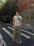 DAXUEN Distressed graphic t-shirt with waffle knit fabric — model photo