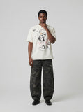 DAXUEN Distressed short-sleeved graphic T-shirt — model photo