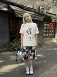 DAXUEN Distressed short-sleeved graphic T-shirt — model photo