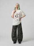DAXUEN Distressed short-sleeved graphic T-shirt — model photo