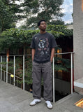 DAXUEN Distressed short-sleeved graphic T-shirt — model photo