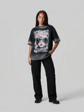 DAXUEN Distressed oversized short-sleeved graphic T-shirt — model photo