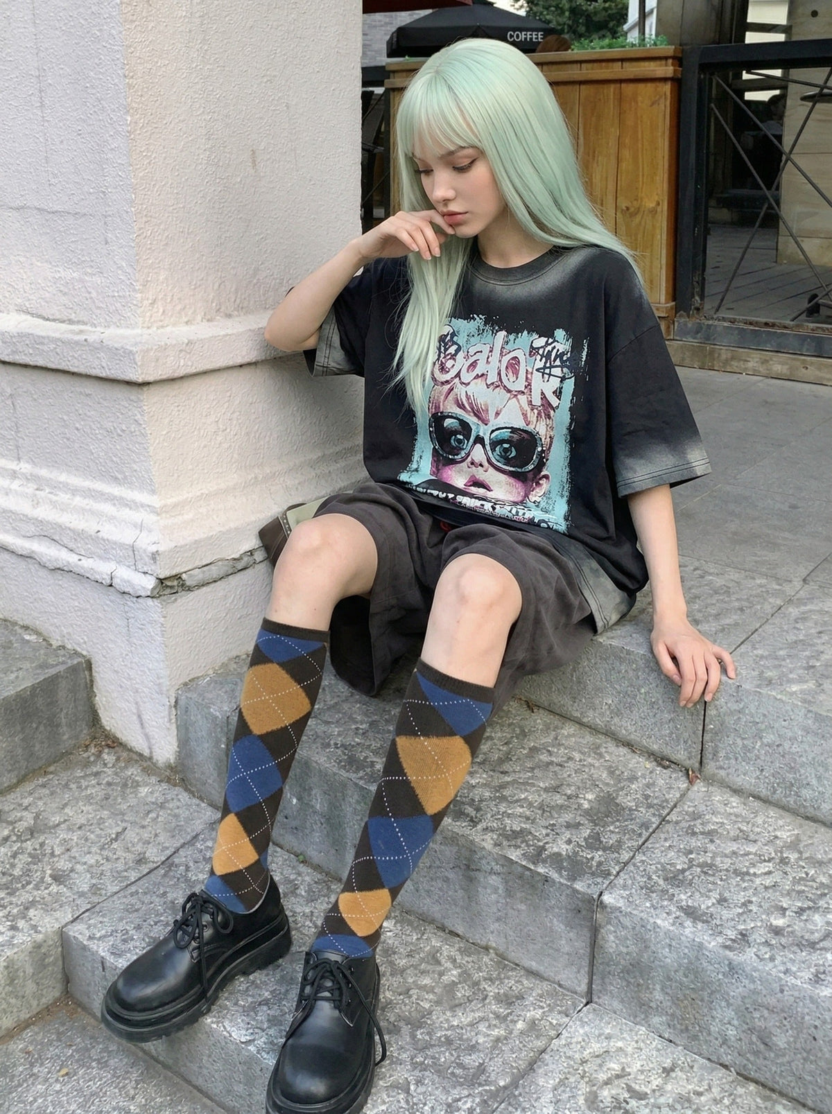 DAXUEN Distressed oversized short-sleeved graphic T-shirt — model photo
