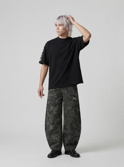 DAXUEN Distressed short-sleeved graphic t-shirt — model photo