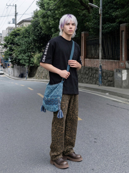 DAXUEN Distressed short-sleeved graphic t-shirt — model photo