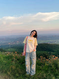 DAXUEN Short-sleeved crew-neck t-shirt with graphic print — model photo