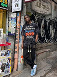 DAXUEN Oversized distressed graphic tie-dye short-sleeve T-shirt — model photo