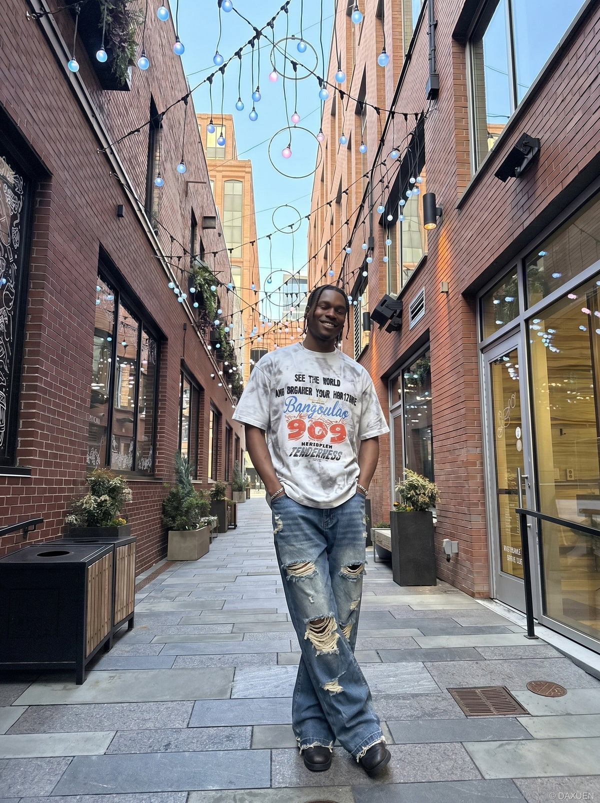 DAXUEN Oversized distressed graphic tie-dye short-sleeve T-shirt — model photo
