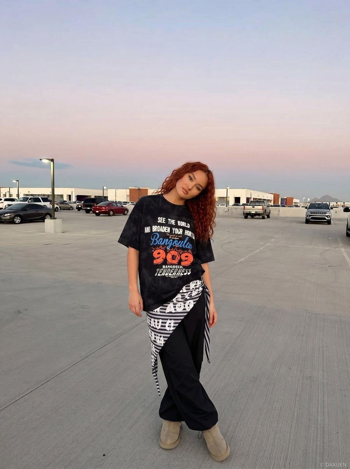 DAXUEN Oversized distressed graphic tie-dye short-sleeve T-shirt — model photo