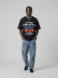 DAXUEN Oversized distressed graphic tie-dye short-sleeve T-shirt — model photo