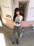 DAXUEN Distressed graphic V-neck short-sleeved t-shirt — model photo