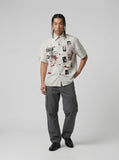 DAXUEN Distressed grunge graphic button-up shirt — model photo
