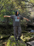 DAXUEN charcoal grey oversized distressed heart graphic tee — model photo