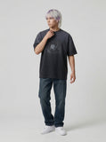 DAXUEN Distressed oversized T-shirt with heart graphic — model photo