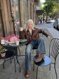 DAXUEN Distressed High-Waisted Flared Jeans | DAXUEN — model photo