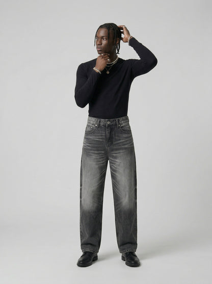 DAXUEN Distressed high-waisted wide-leg jeans in washed black denim — model photo