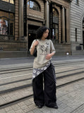 DAXUEN Oversized short-sleeve T-shirt with horse graphic — model photo