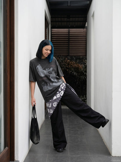 DAXUEN distressed illustrative graphic tee — model photo