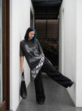 DAXUEN distressed illustrative graphic tee — model photo