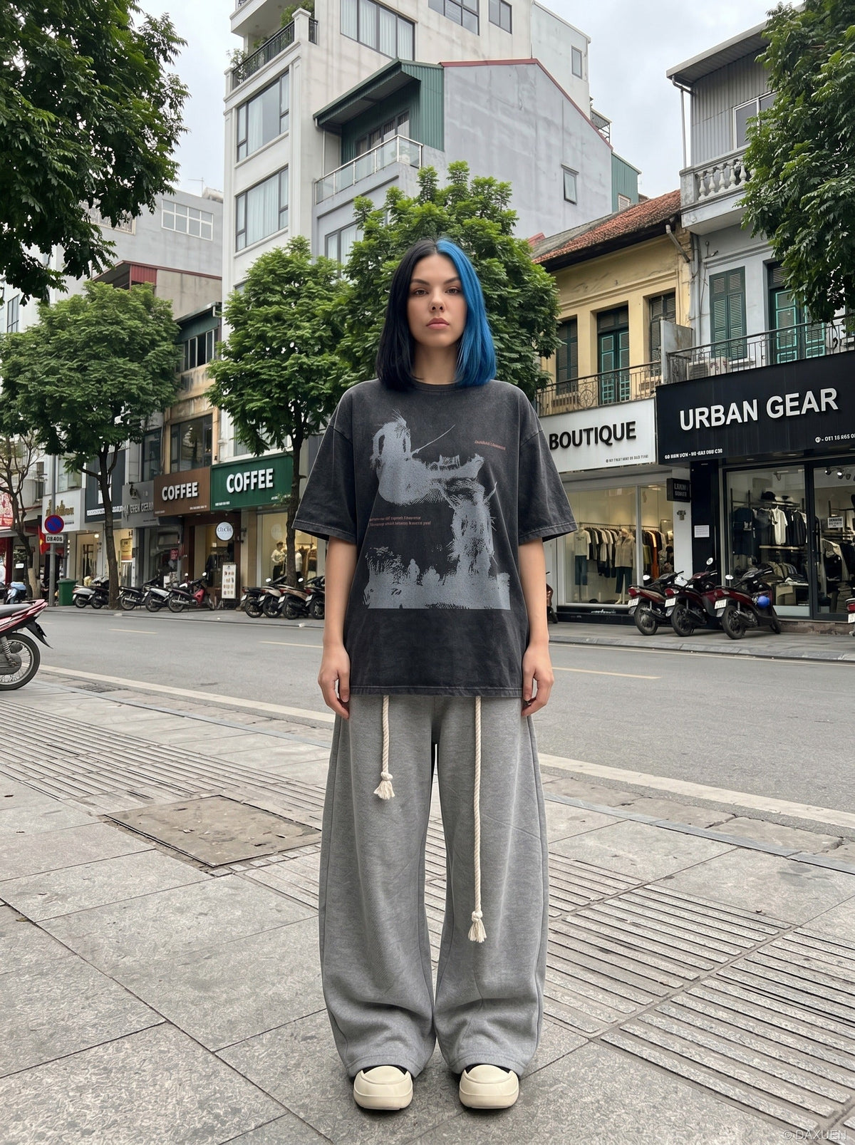 DAXUEN distressed illustrative graphic tee — model photo