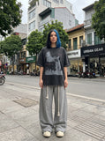 DAXUEN distressed illustrative graphic tee — model photo