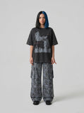 DAXUEN distressed illustrative graphic tee — model photo