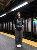 DAXUEN distressed illustrative graphic tee — model photo