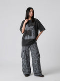 DAXUEN distressed illustrative graphic tee — model photo